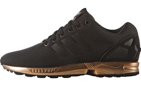 zwarte adidas flux met goud